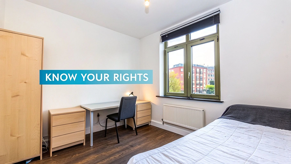 A bright, simple student bedroom with a bed, desk, chair, and wardrobe, with 'KNOW YOUR RIGHTS' overlay.