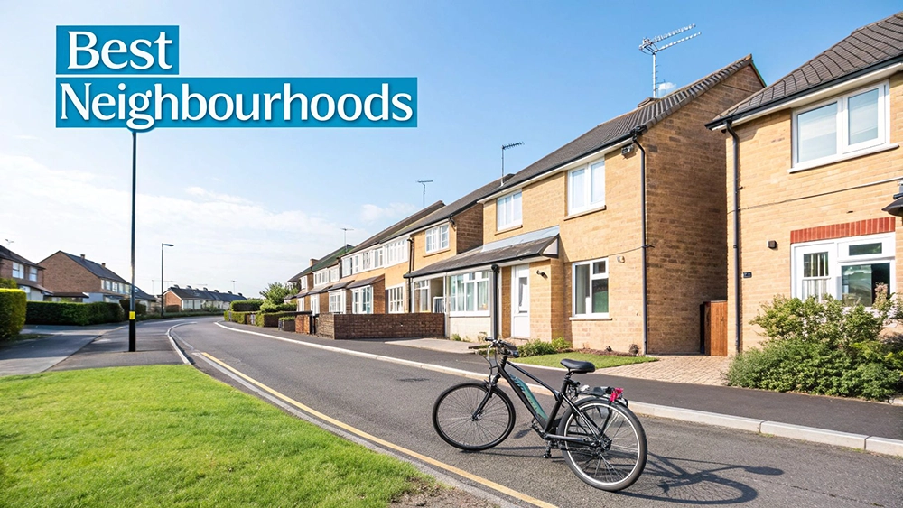 Suburban residential street with modern brick houses and bicycle parked on quiet neighbourhood road