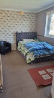 Photo Of Furnished Room with TV, Table & Bed in East Leake